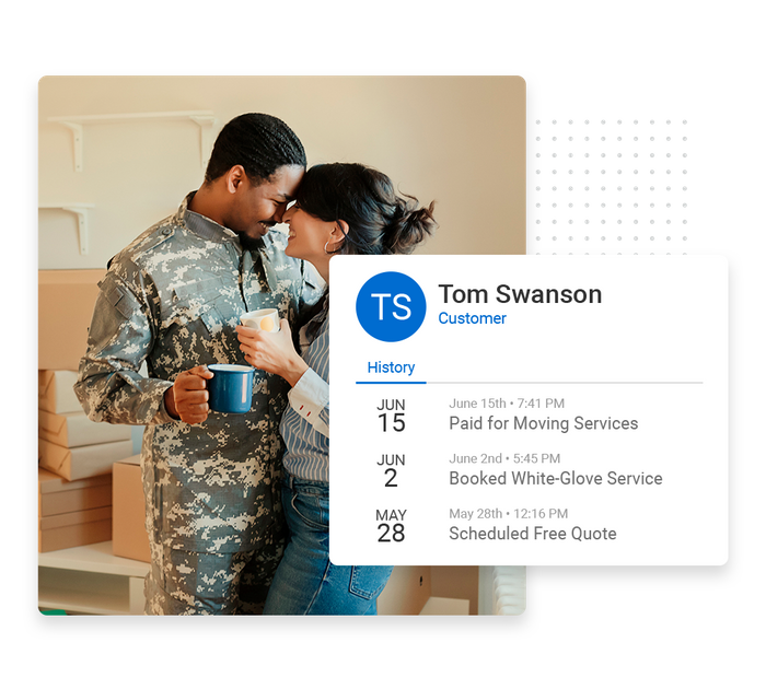 Happy couple in front of moving boxes overlaid with client history details from the Marketing 360® CRM moving company CRM