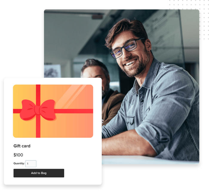 Man smiling sitting with another man whose face is overlaid with a product page for a gift card Gift card product page